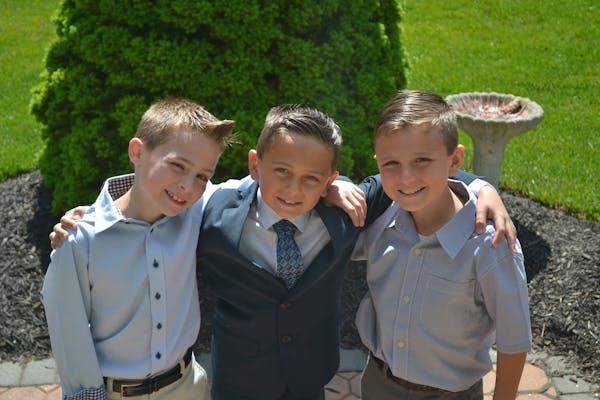 group of brothers in formal wear
