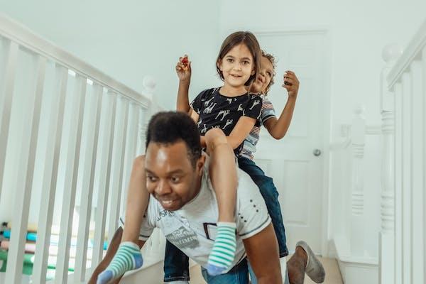 picture of a playing family